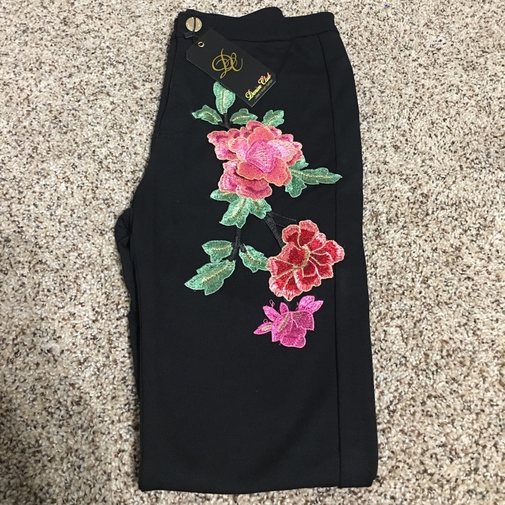 Black embroidered skinny leg pants!