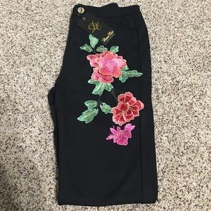 Black embroidered skinny leg pants!