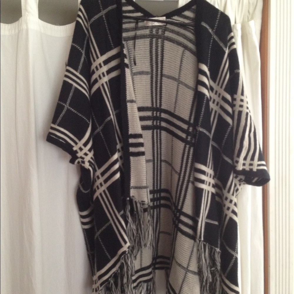 Cape Style sweater with fringe. Reversible