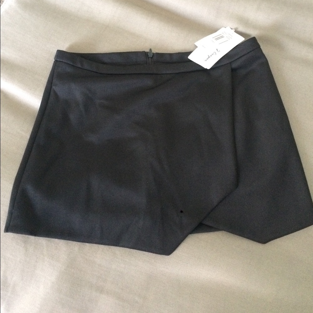Black wrap around mini skirt