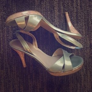 Stuart Weitzman criss cross sling back sandal.