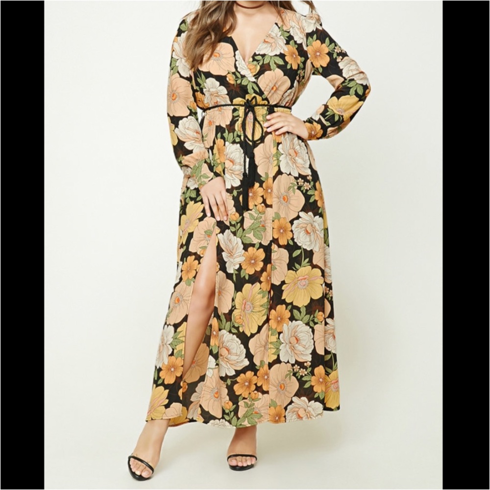 Long, flowy black floral maxi with M-slit hemline.