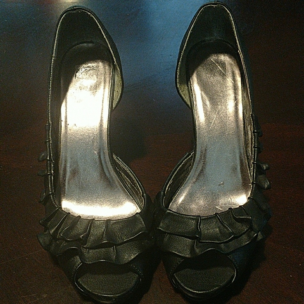 Stiletto black man made looks just like leather