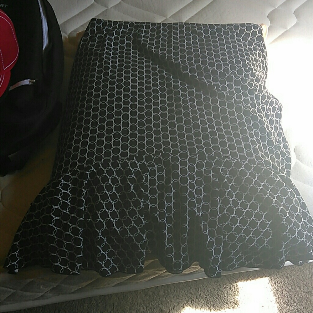 skirt right above the knee with ruffle at the bott