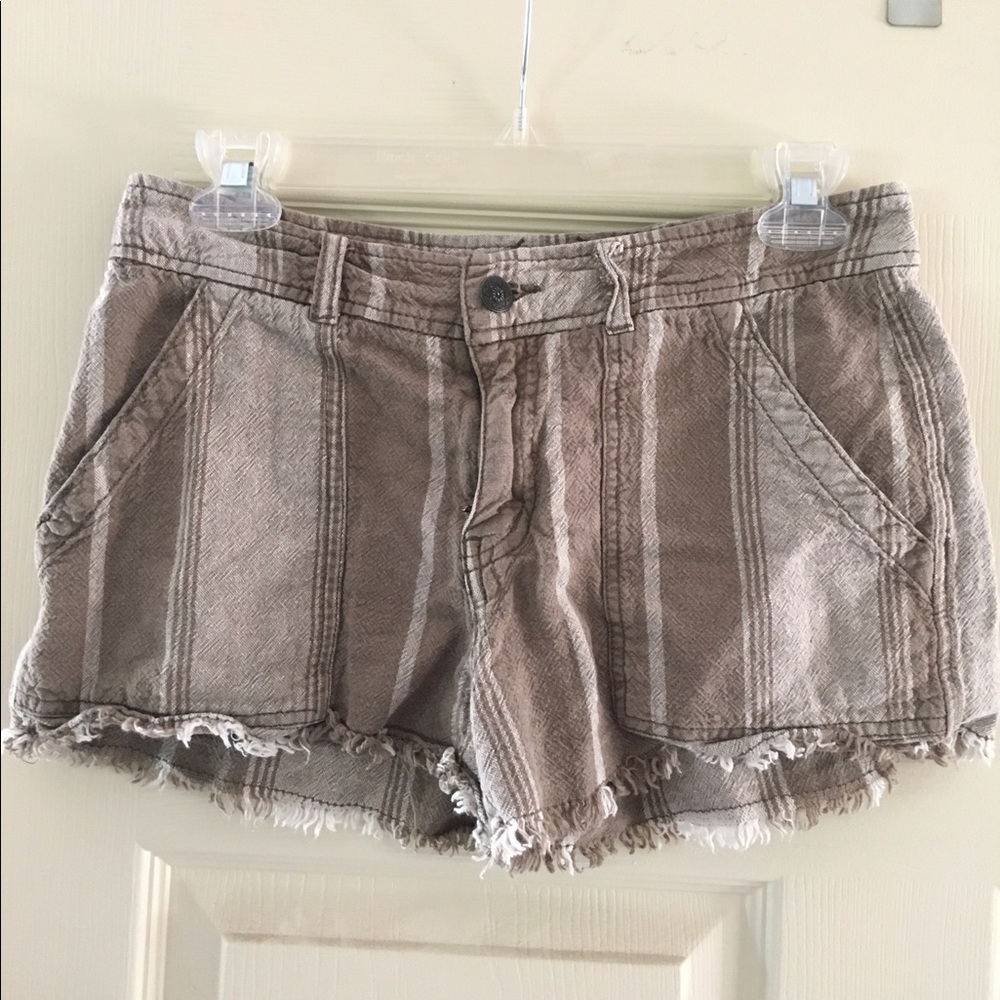Free People brown/white striped shorts.
