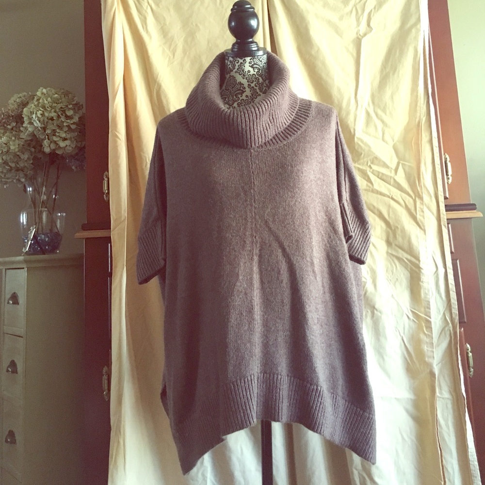 Three quarter sleeved turtleneck sweater