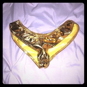 Brand new!!! Gold booty shorts.