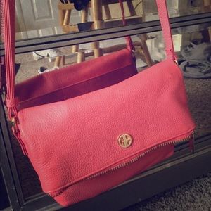 A pink body cross purse