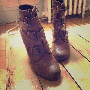 Distressed bucked booties in brown leather