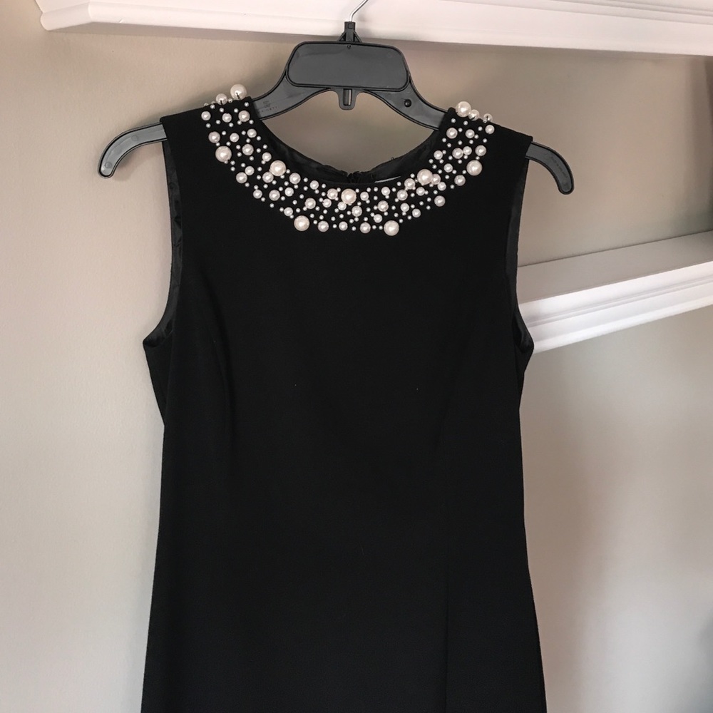Brand new Calvin Klein black dress with pearls