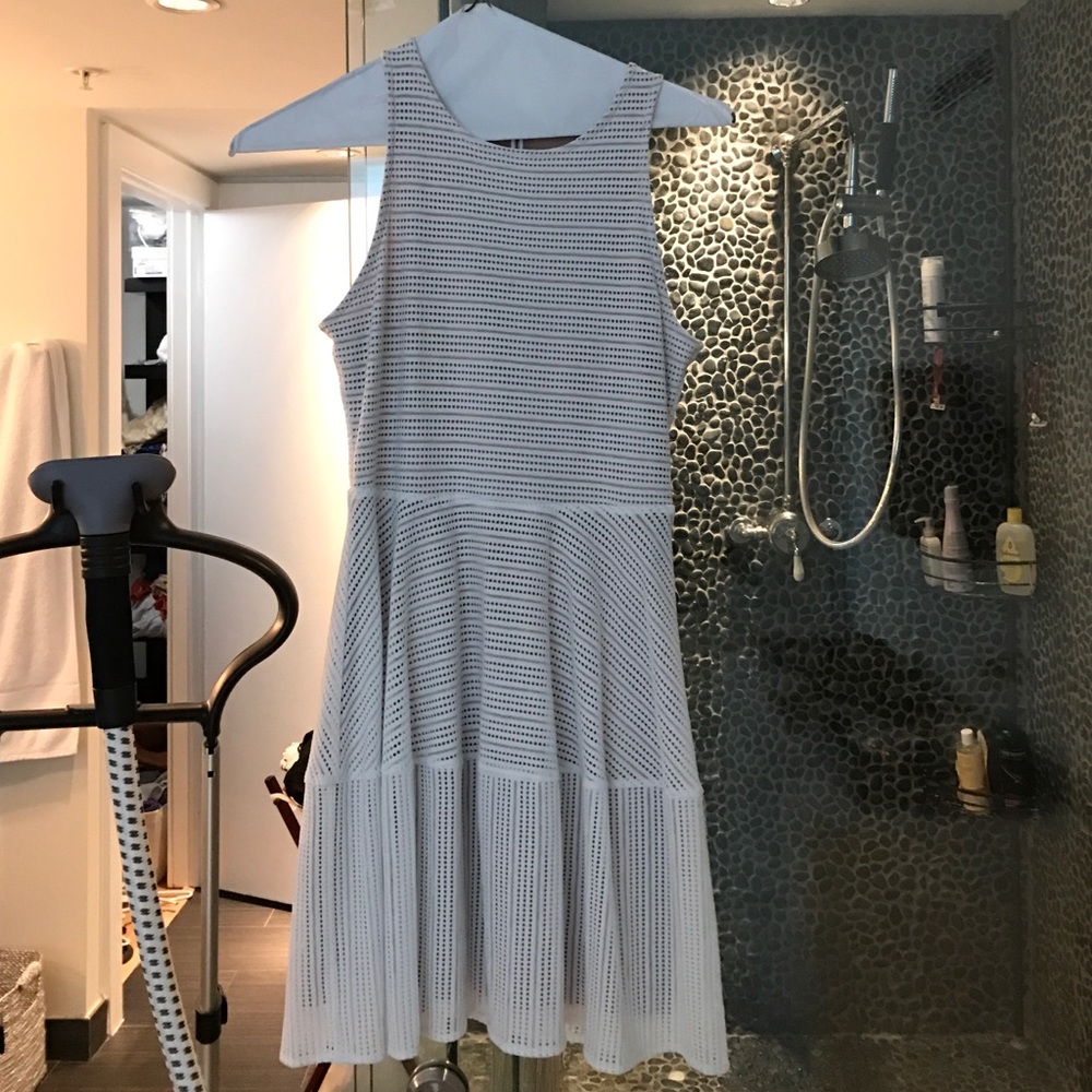 White cotton dress with overlay.