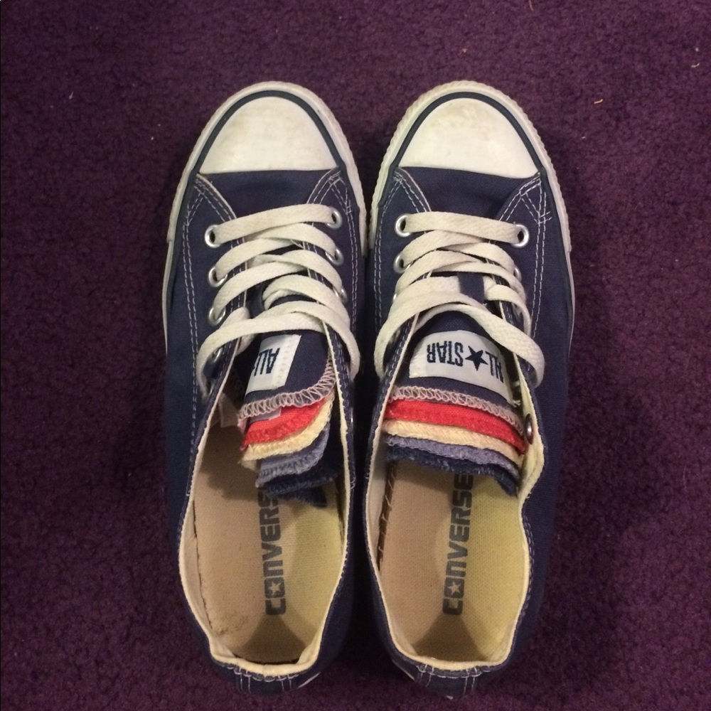 Navy multi tag converse low tops