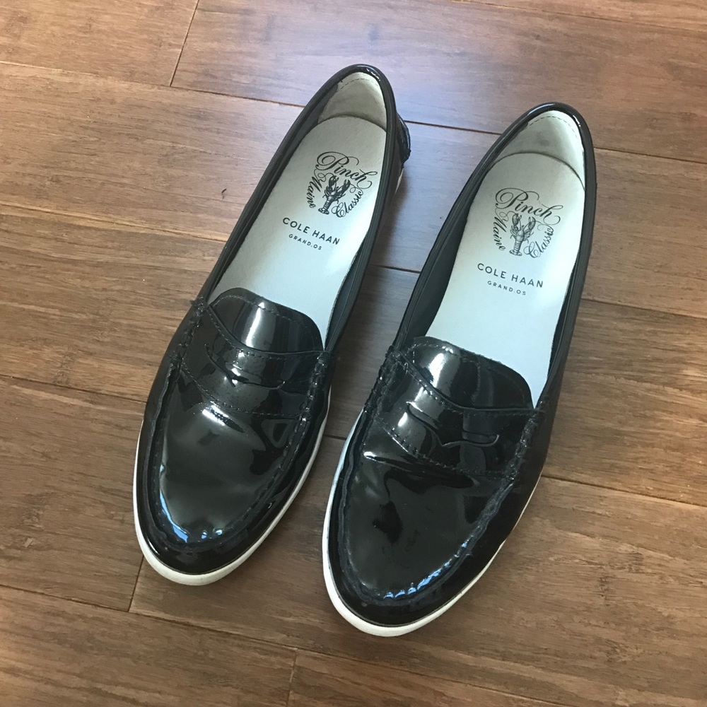 Cole Haan black patent penny loafers