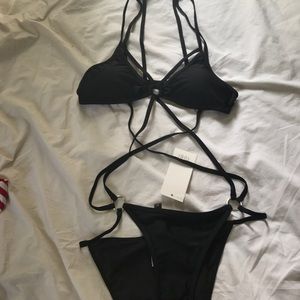 NWT black strappy harness style bathing suit