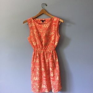 pink and tan patterned dress
