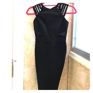 Bebe size XS little black dress back details