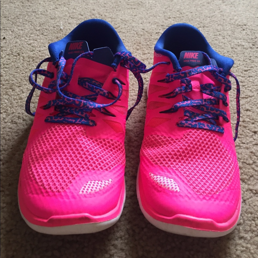 Hot pink and Blue Nike free runs