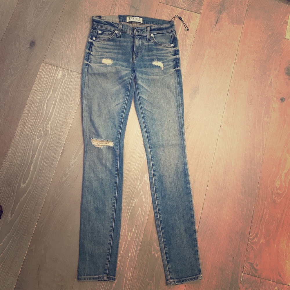 Distressed jeans size 24 never worn