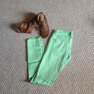 Bright green skinny jeans