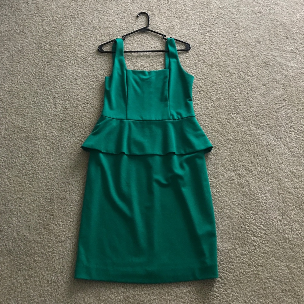 Green peplum dress