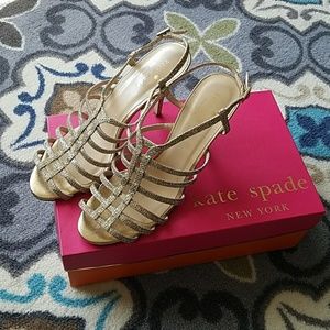 Designer gold cage heels