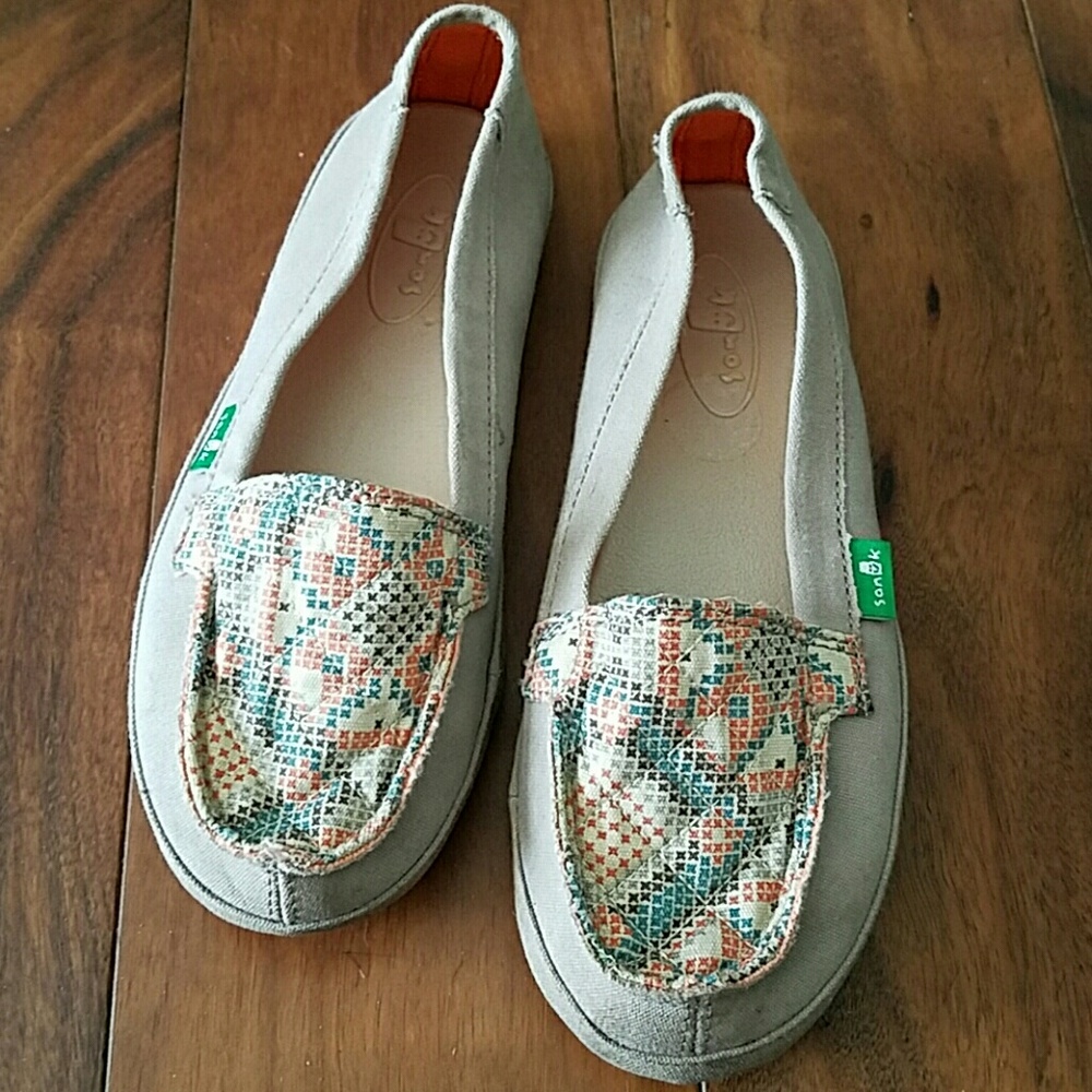 SOLD. Sanuk slip ons size 5