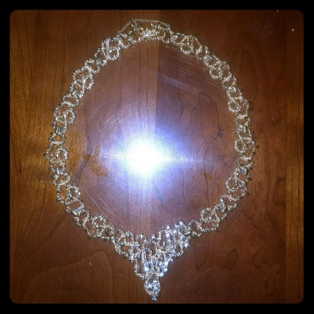 Vintage gold tone and rhinestone choker.