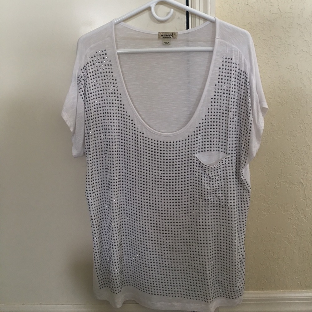 White top w/ silver studs.