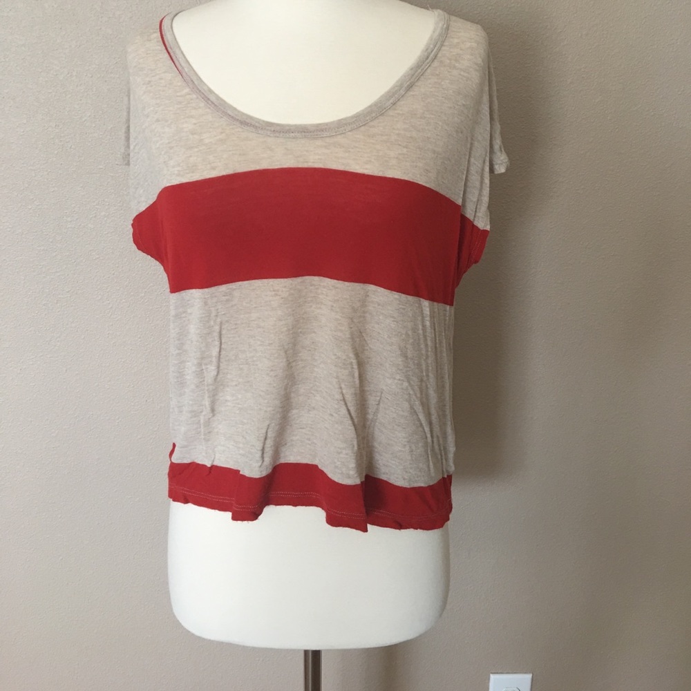 Tan and red short sleeve top.