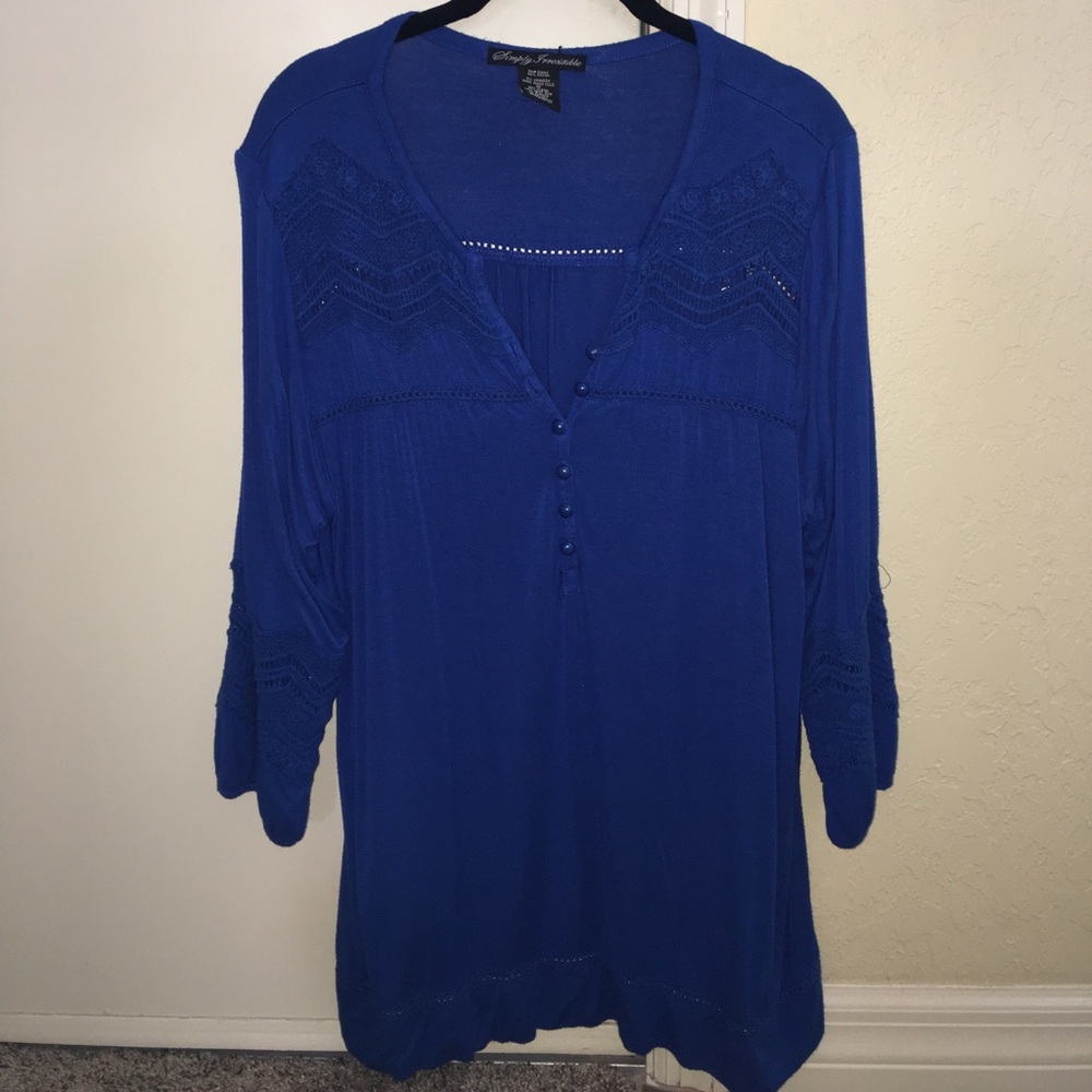 Royal blue top with lace.