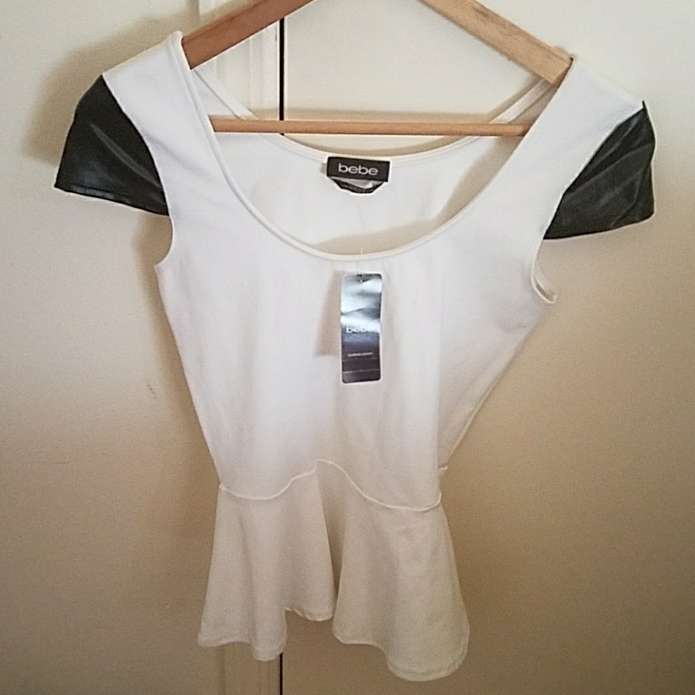 Bebe KSS wet sleeve peplum top.