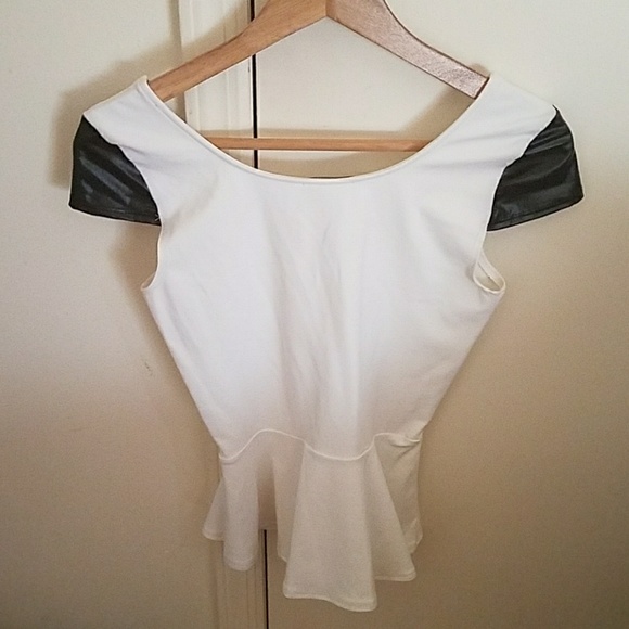 Bebe KSS wet sleeve peplum top. - Picture 2 of 4