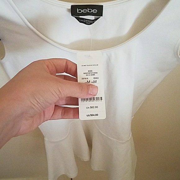 Bebe KSS wet sleeve peplum top. - Picture 3 of 4