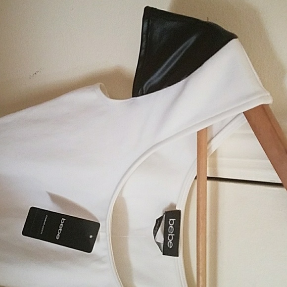 Bebe KSS wet sleeve peplum top. - Picture 4 of 4