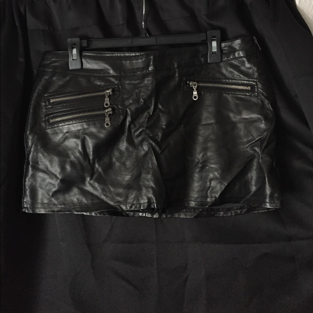 Mini black leather skirt