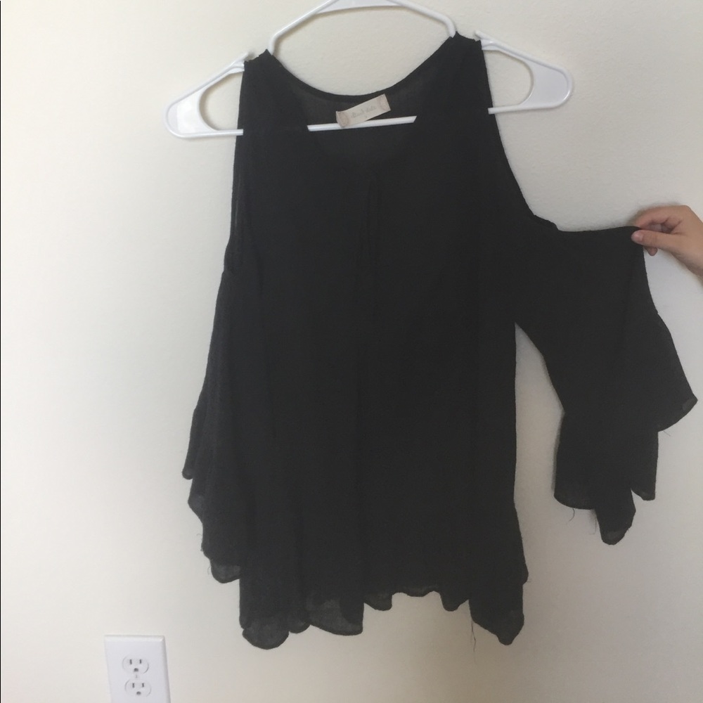 Black shirt.