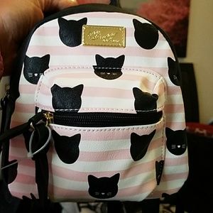 Betsy Johnson mini backpack with kitty plush.