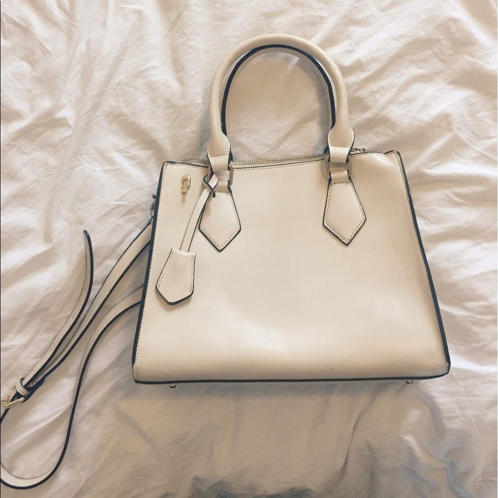 Cream colored structured hand bag