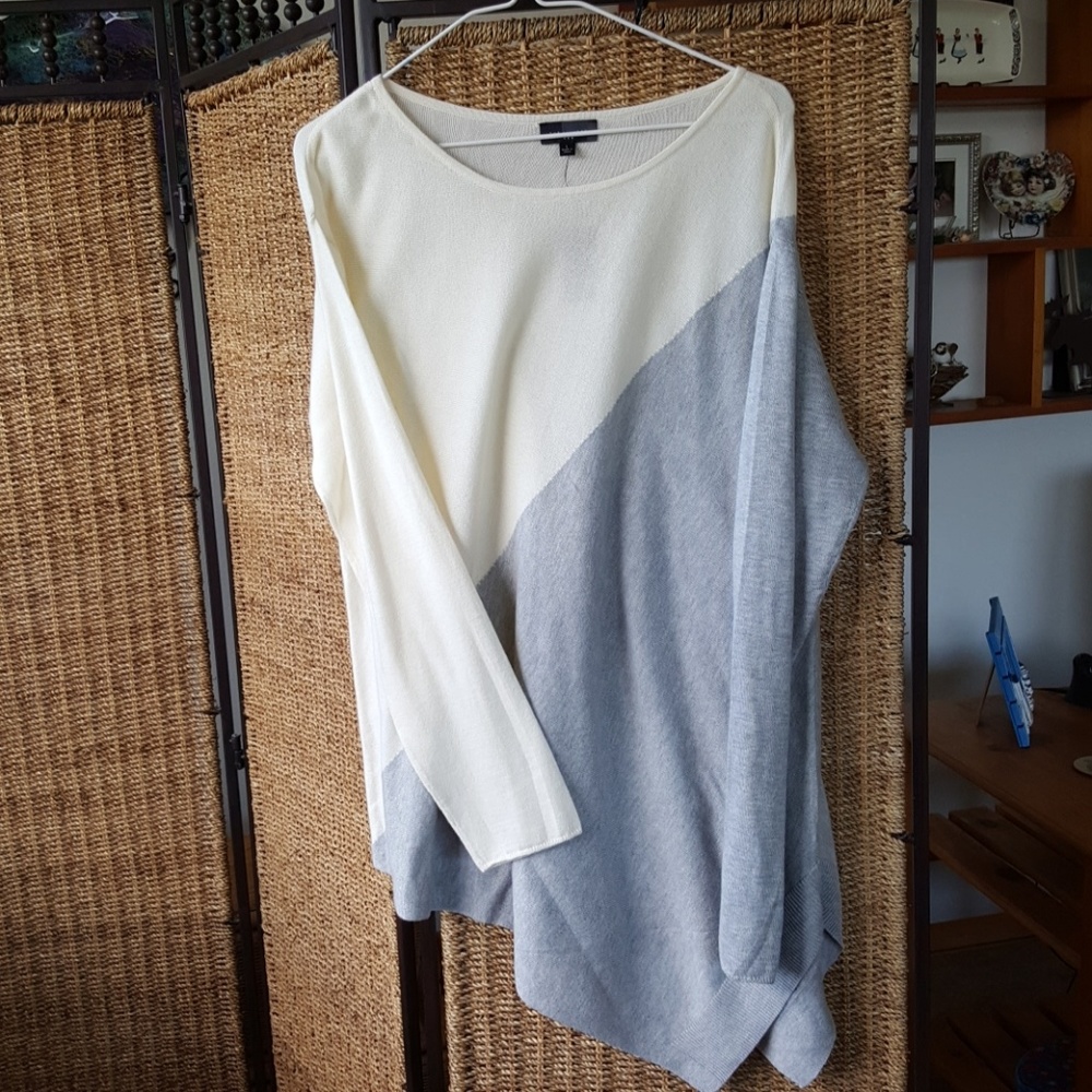 Off white and gray. Light sweater.