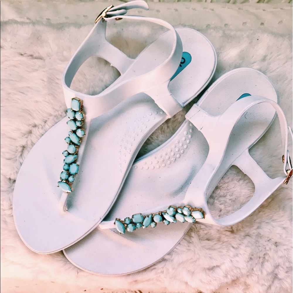 White sandals with blue stones