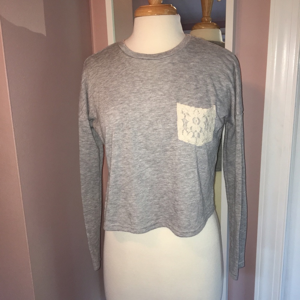 Sweater-shirt with lace pocket