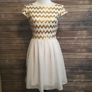 White and gold sequin dress