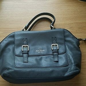 Gray Kate Spade bag. Has stuffing and dust bag.
