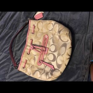 Beautiful gold and pink authentic Coach purse