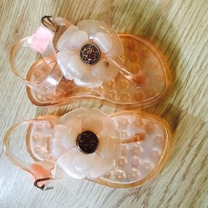 GAP light pink jelly thongs.