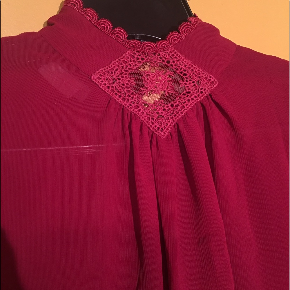 Red blouse with beautiful neck details