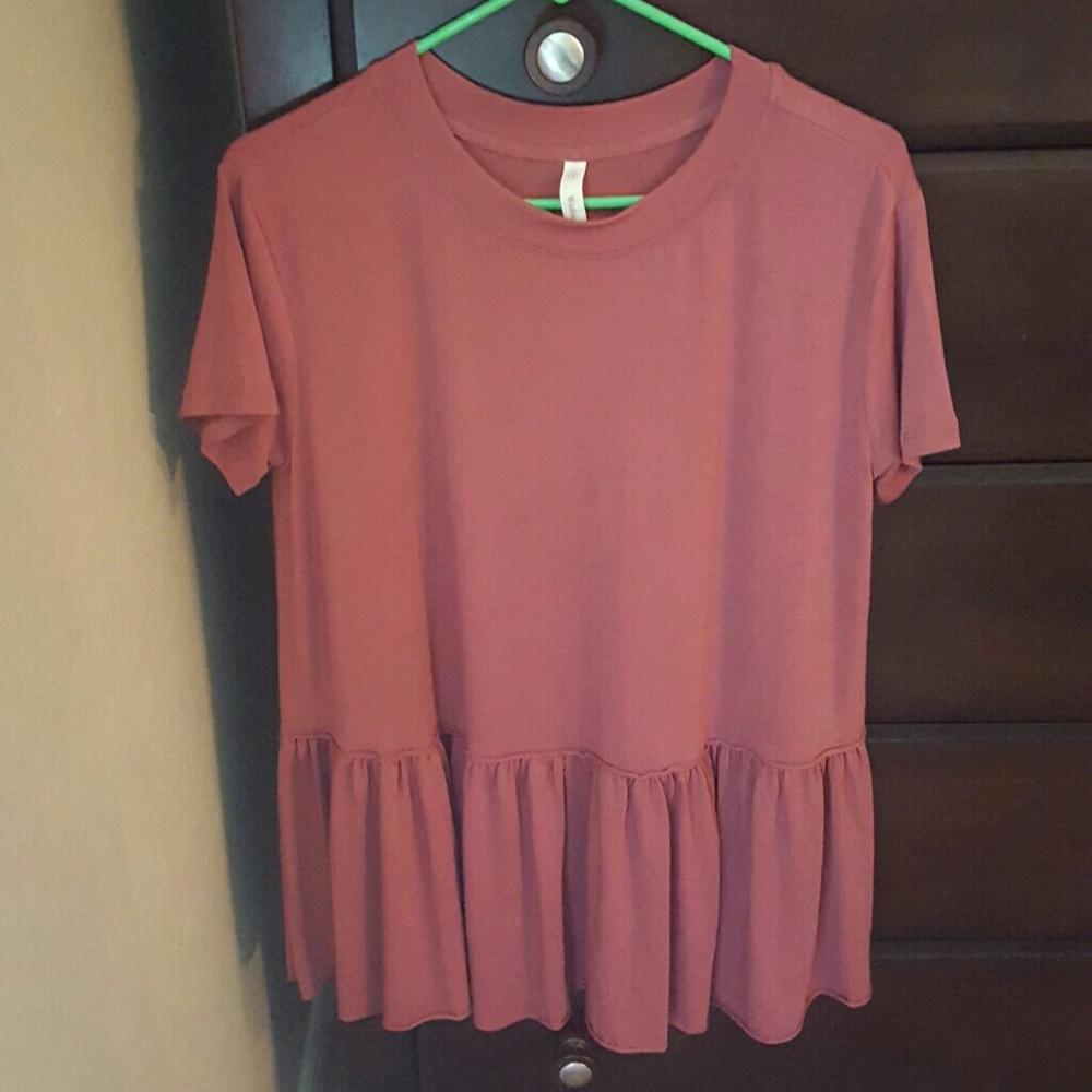 NWOT Rose colored ruffle tee. Size small.