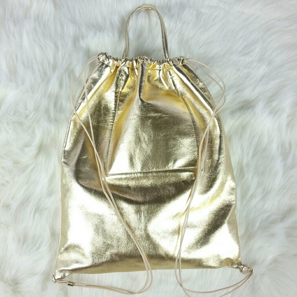 KARA drawstring-close gold leather backpack main image 4
