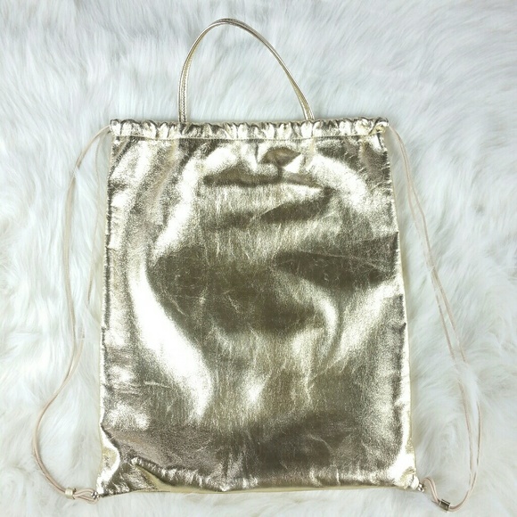 KARA drawstring-close gold leather backpack main image 5