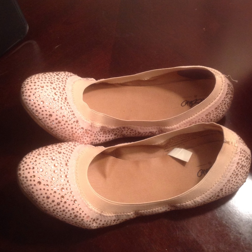 Pink embellished ballet flats